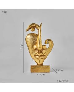 Sculpted Splendor: Elevate Your Space with Golden Face Art